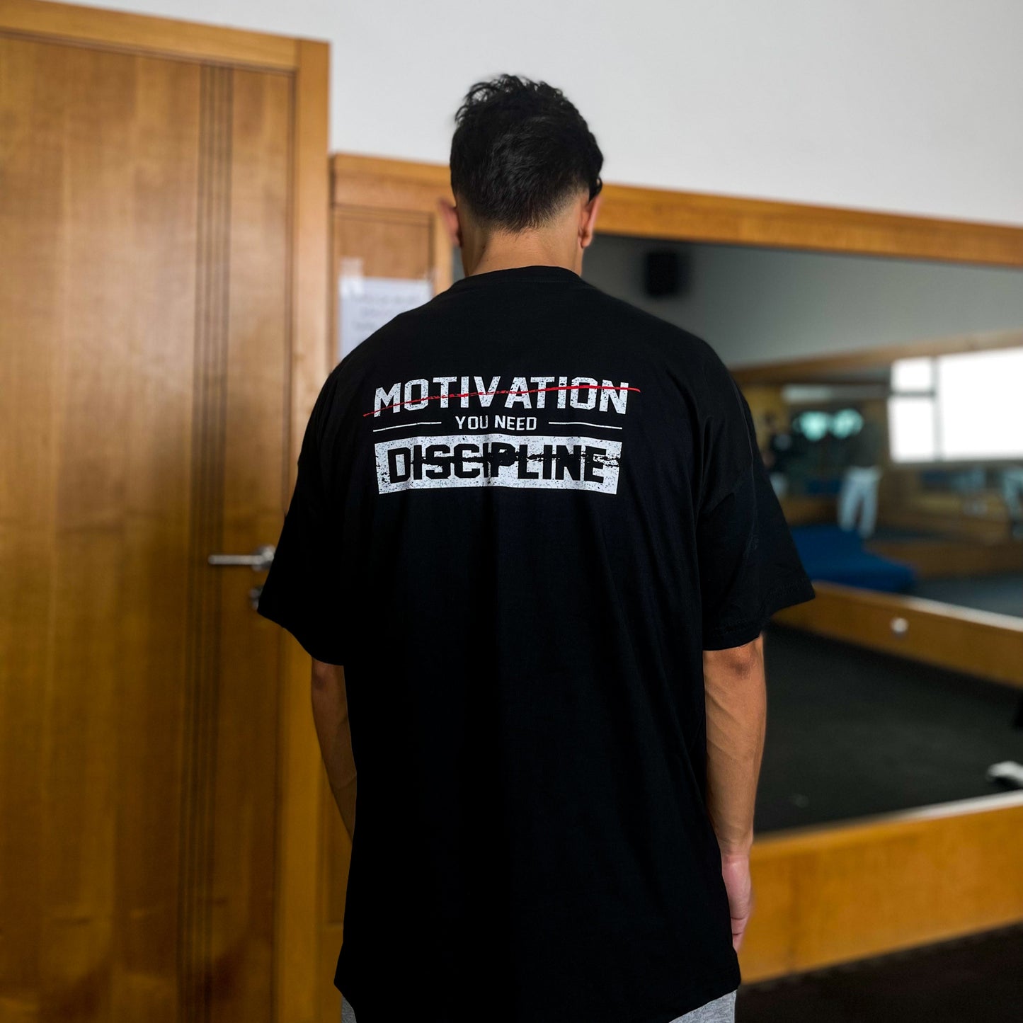 Discipline Over Motivation Tee - Commit to the Grind